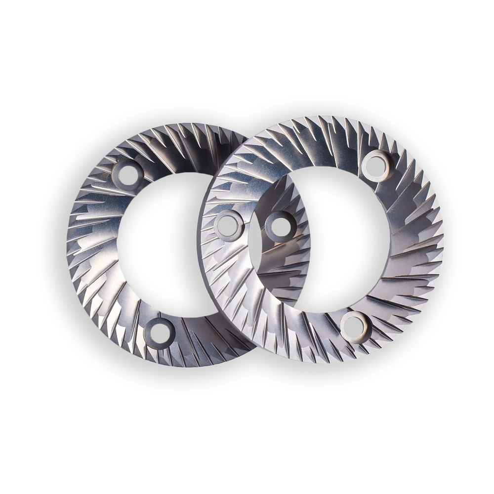 Two toothed, ring-shaped Fellow Ode Gen 2 flat burrs shown removed from the grinder