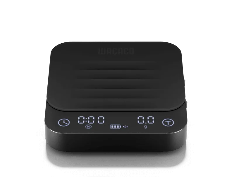 Black Wacaco Exagram Pro espresso scale with a ribbed silicone mat and illuminated timer and weight display